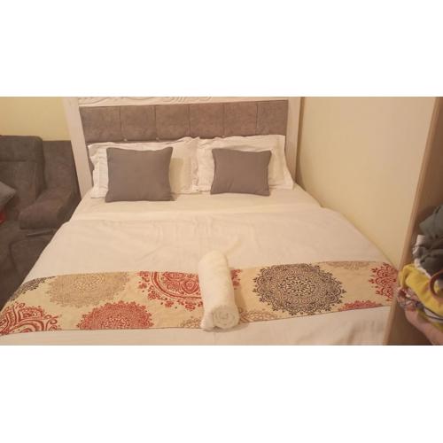 Opposite Moran Lounge