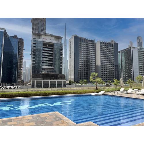 Outsider Vacation Homes - 1BR Burj Khalifa View Downtown 10min Walk to Dubai Fountain