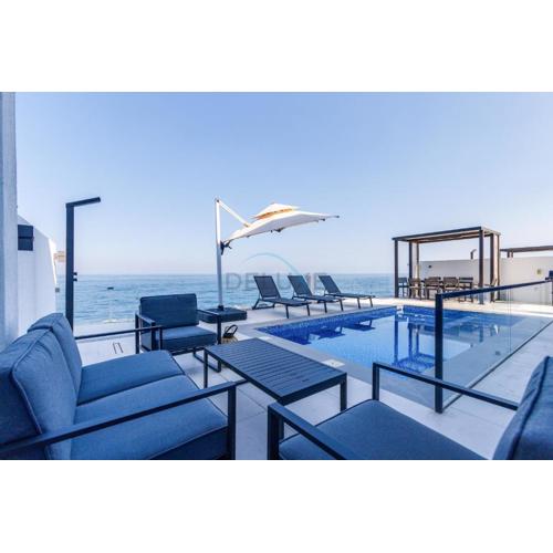 Overlooking Pool, Mountain and Sea 6BR Villa with Two Assistant Room, Heated Pool, BBQ Area, Al Dana Island, Fujairah by Deluxe Holiday Homes