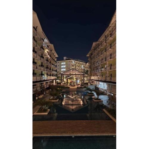 OVERTIME STAYCATION - Nearest to Airport with FREE POOL & GYM ACCESS