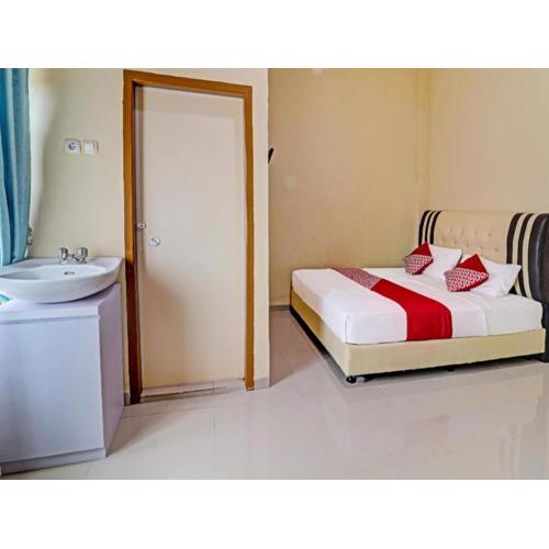 OYO 90945 Arizon Kost