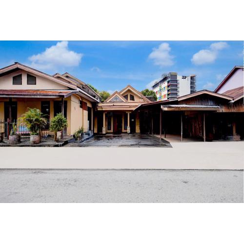 OYO 94775 Palm Cafe Inn