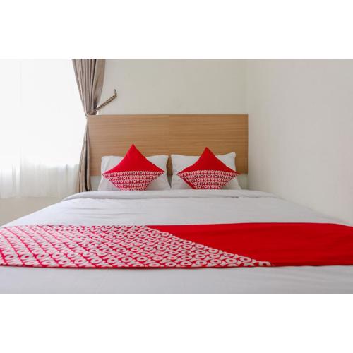 OYO Flagship 1603 Antosa Family Residence Silver Key