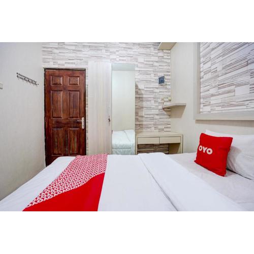 OYO Life 90606 Glass House Citraland Syariah