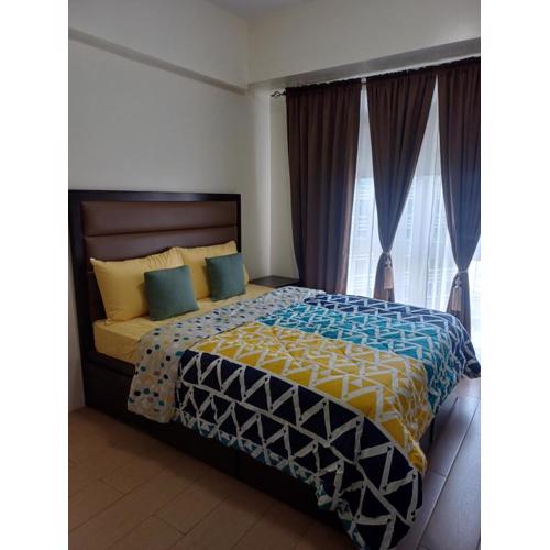 Pasay 1BR Family Staycation with Parking in 150 Newport Boulevard near Resort World & NAIA T3