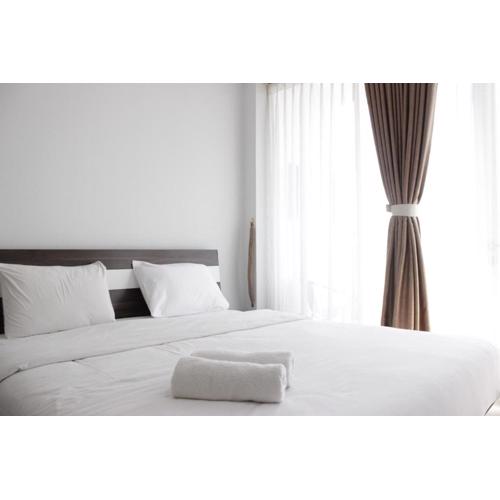 Pleasant 1BR Apartment with Sofa Bed at Dago Suites By Travelio