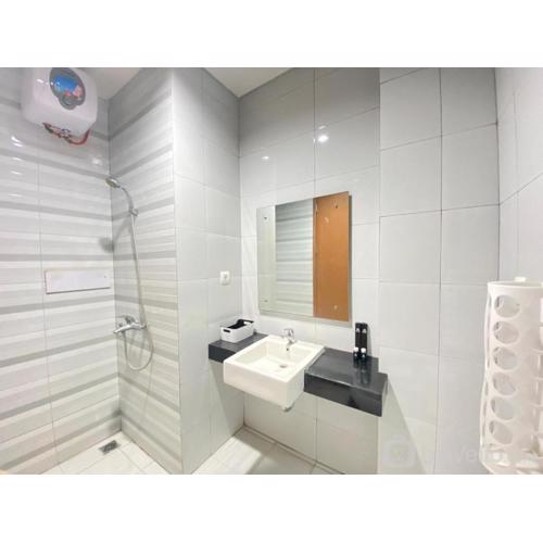 Pleasant 1BR Deluxe at Dago Suites Apartment near ITB By Travelio