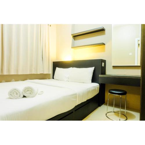 Pleasant 2BR Apartment at Green Pramuka City near Mall By Travelio