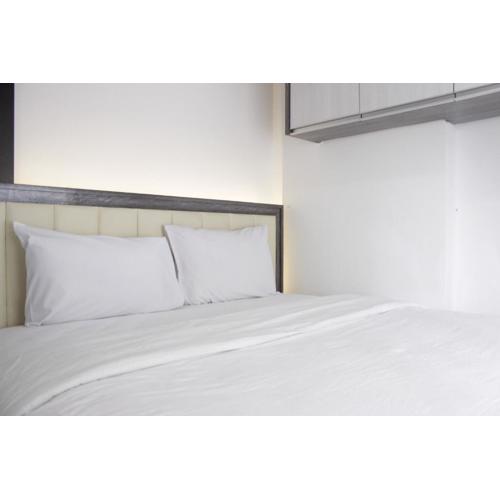 Pleasant 2BR at Grand Asia Afrika Apartment By Travelio