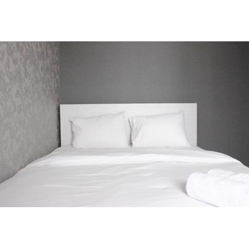 Pleasant and Homey 2BR Apartment at Tamansari La Grande By Travelio