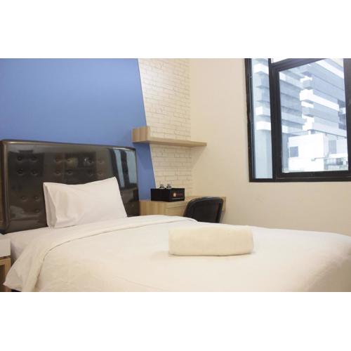 Pleasant Studio Semi Apartment at The Lodge Paskal near BINUS University By Travelio