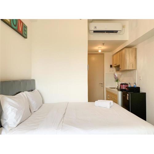 Pleasurable 2BR Transpark Juanda Apartment By Travelio
