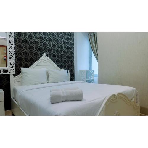 Pool View 2BR Apartment at Capitol Park Residence By Travelio