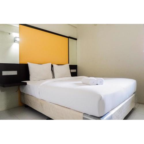 Pool View 2BR at Dian Regency Apartment By Travelio