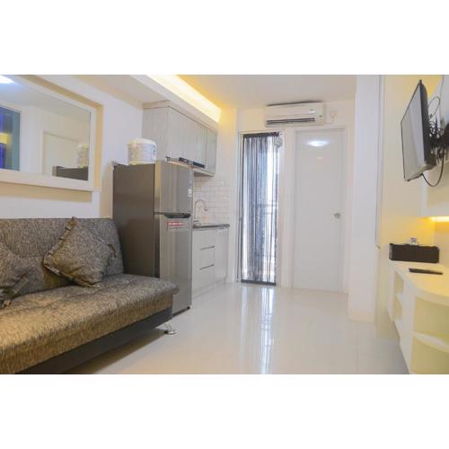 Pool View 2BR with Sofa Bed Bassura City Apartment By Travelio