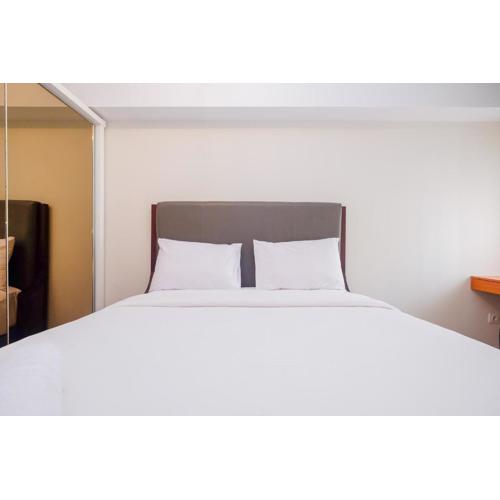 Pool View and Homey 2BR Apartment Springlake Summarecon Bekasi By Travelio