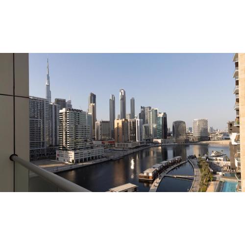 Prime Spacious 2 BR Apt, Burj Khalifa & Canal View - Scala Tower