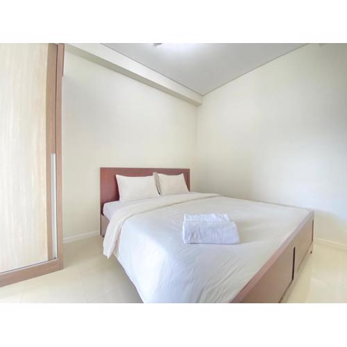 Private & Bright 2BR Apartment at Parahyangan Residence near Nara Park By Travelio
