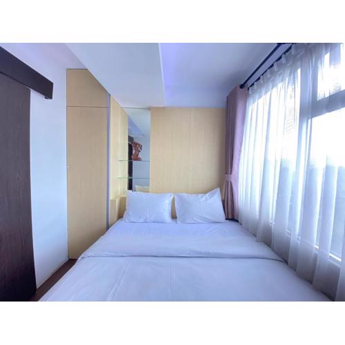 Quite 2BR Apartment AC in Living Room at The Jarrdin Cihampelas By Travelio