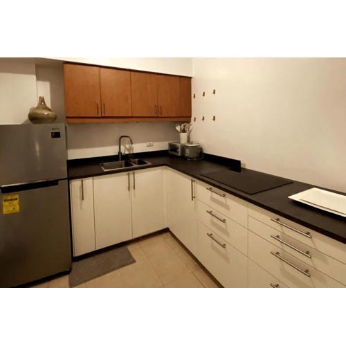 Raya Garden High Rise Vacation Home airport & city view