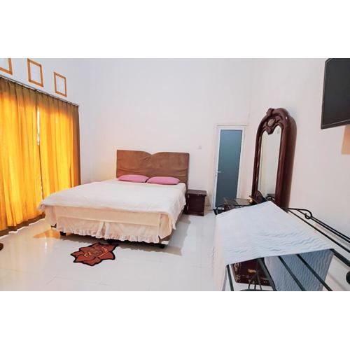 RedDoorz at Family Syariah Homestay kotamobagu