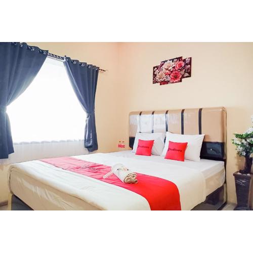 RedDoorz at Homestay OTW Manna