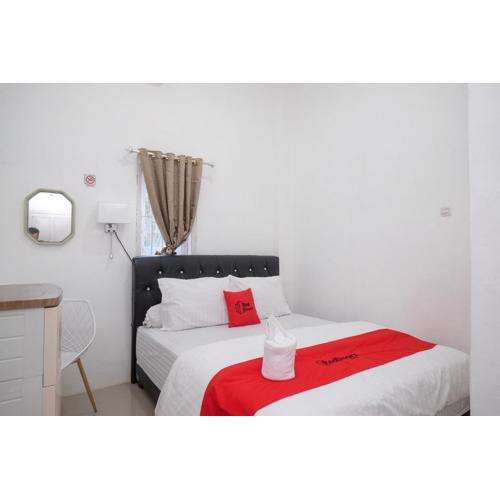 RedDoorz Plus At Lovina Inn Tonrangeng River Side