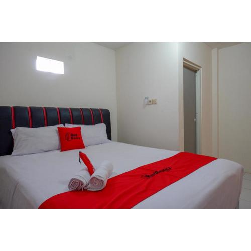 RedDoorz Syariah near GOR Satria 4