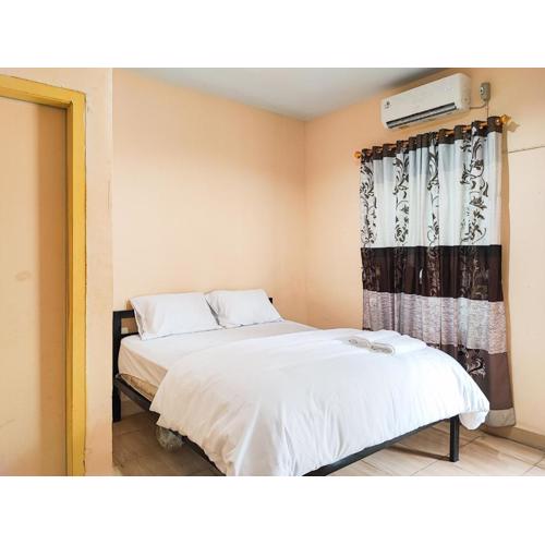 RedDoorz Syariah near Terminal Alam Barajo Jambi