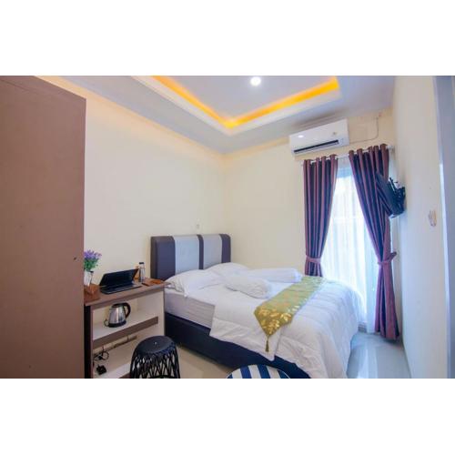 RedDoorz syariah near Universitas Islam Riau