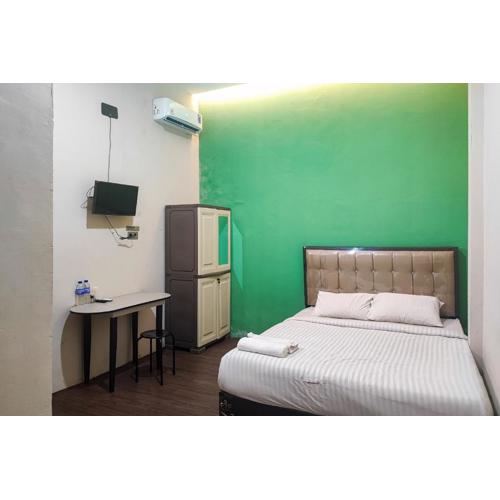 RedDoorz Syariah near Universitas Jambi Telanaipura