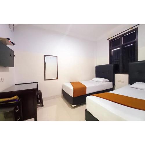 RedDoorz Syariah near Universitas Muhammadiyah Bungo