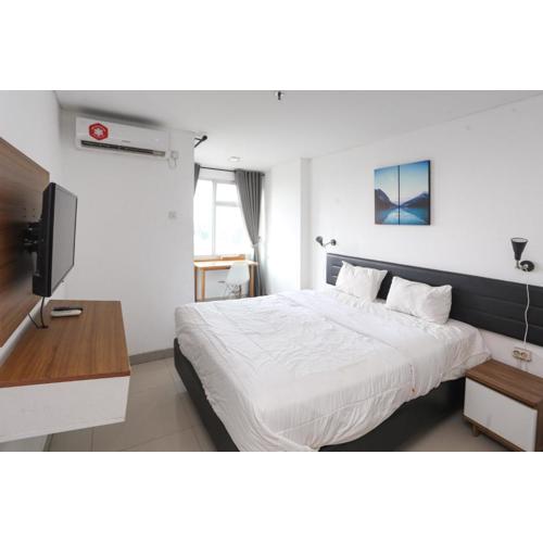 RedLiving Apartemen Enviro Cikarang - Stars Rooms