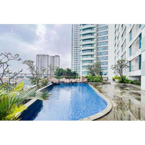 RedLiving Apartemen Grand Kamala Lagoon by Ownr Room