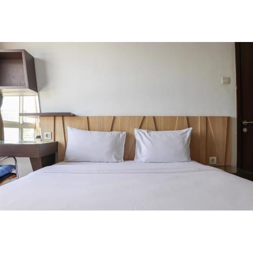 Relaxing 2BR Apartment at Scientia Residence By Travelio