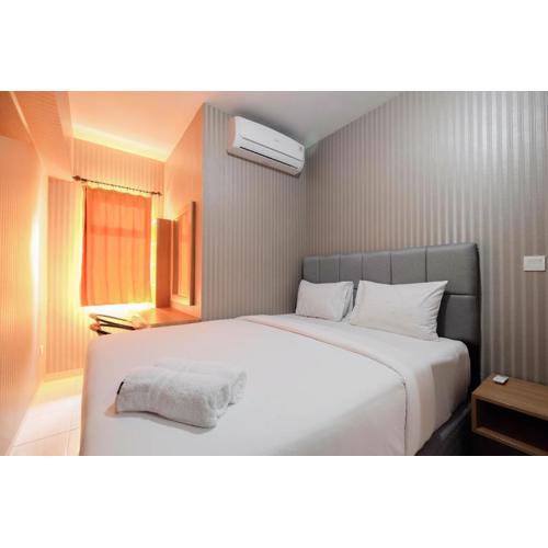 Relaxing 2BR Apartment at The Springlake Summarecon By Travelio
