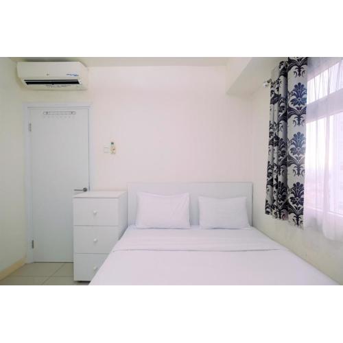 Relaxing 2BR at Green Pramuka Apartment By Travelio
