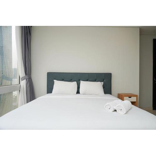 Relaxing 2BR at The Empyreal Condominium Epicentrum Apartment By Travelio