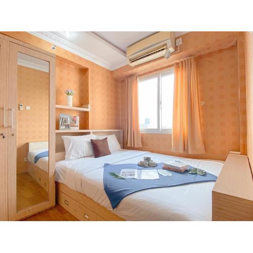 Relaxing 2BR with Pool View Mutiara Bekasi Apartment By Travelio