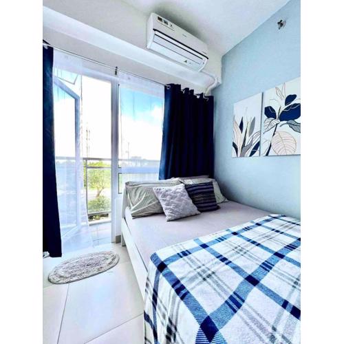 Relaxing Home with Balcony, Wi-FI and Netflix at SMDC Cool