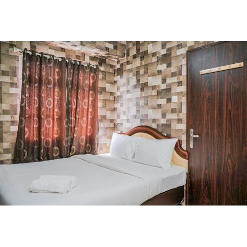 Relieved 1BR Apartment at Serpong Greenview By Travelio