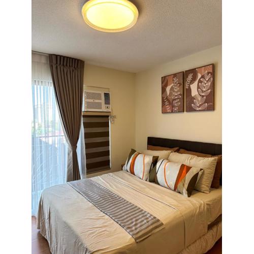 Resort-inspired Condo with Queen-size bed & 50-inch Smart TV