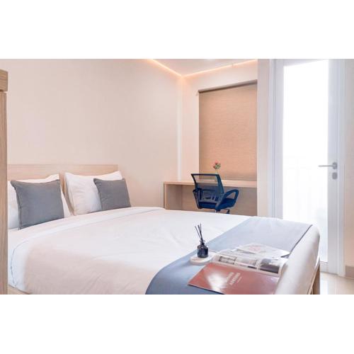 Restful and Cozy Living Studio Apartment at B Residence By Travelio