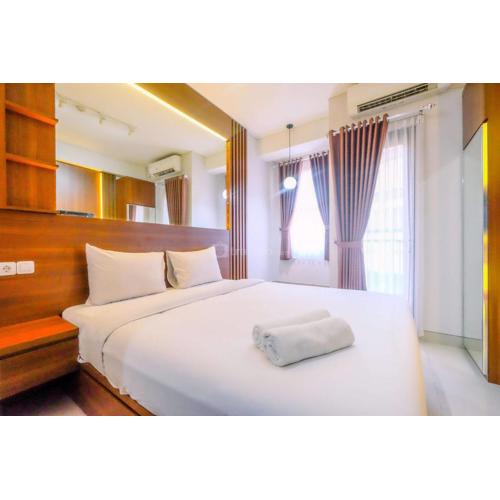 Restful and Minimalist Studio Transpark Cibubur Apartment By Travelio