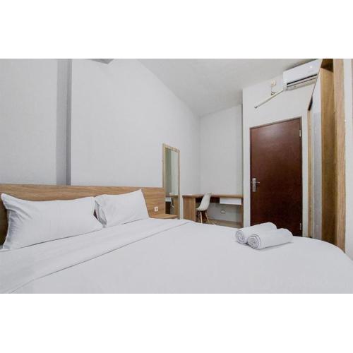 Restful and Modern 2BR Majestic Point Serpong Apartment By Travelio