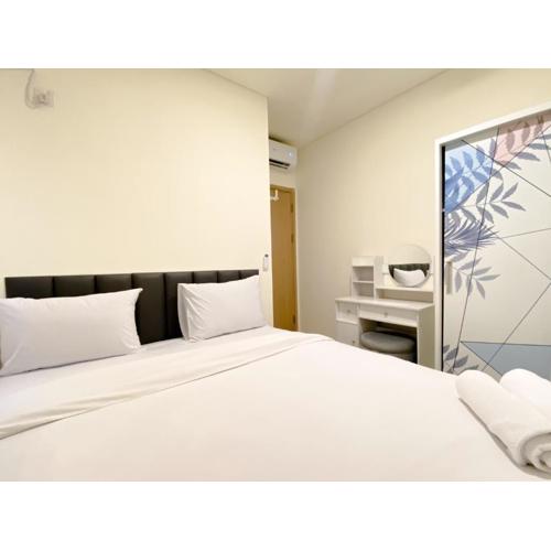 Restful and Modern Look 2BR at Meikarta Apartment By Travelio