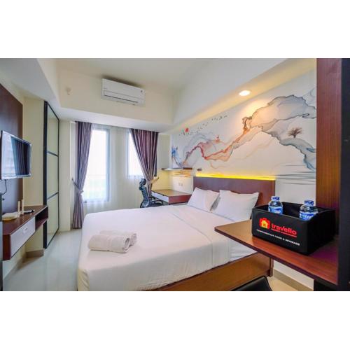 Restful and Tidy Studio at Evenciio Margonda Apartment By Travelio