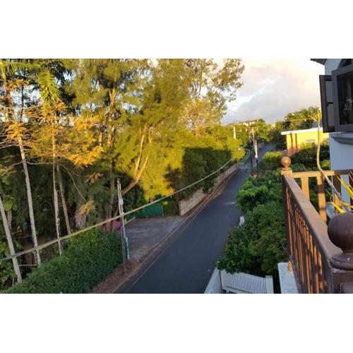 R&G Justlikehome Apartment 1 with blue sofa set and Apartment 2 with Garden View with brown sofa set