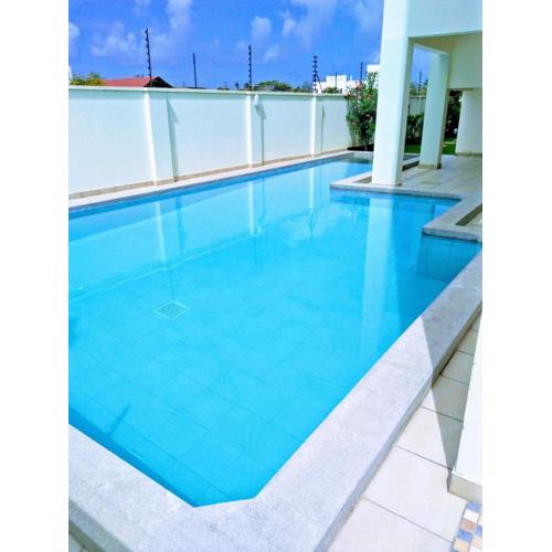 Roma Stays - 1 bedroom at Seville Residency with Swimming pool behind Go-Cart near Sarova