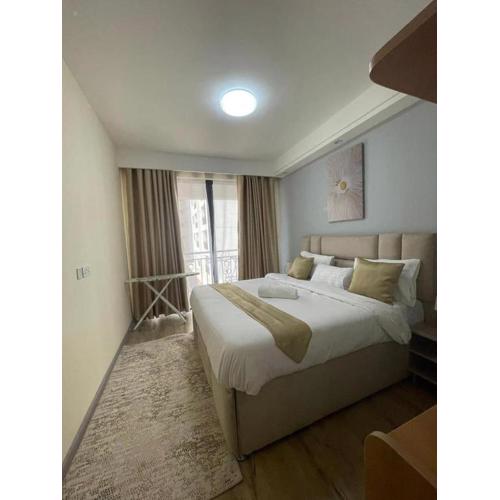 royal essence apartment with heated swimming pool,ample parking space,fully equipped gym and amazing scenic city views